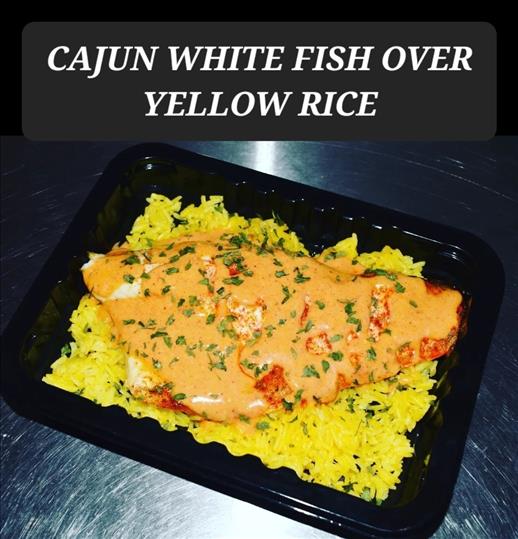 CAJUN WHITE FISH OVER YELLOW RICE