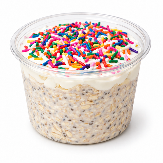 LOVE IS LOVE OVERNIGHT OATS in a cup on a white background